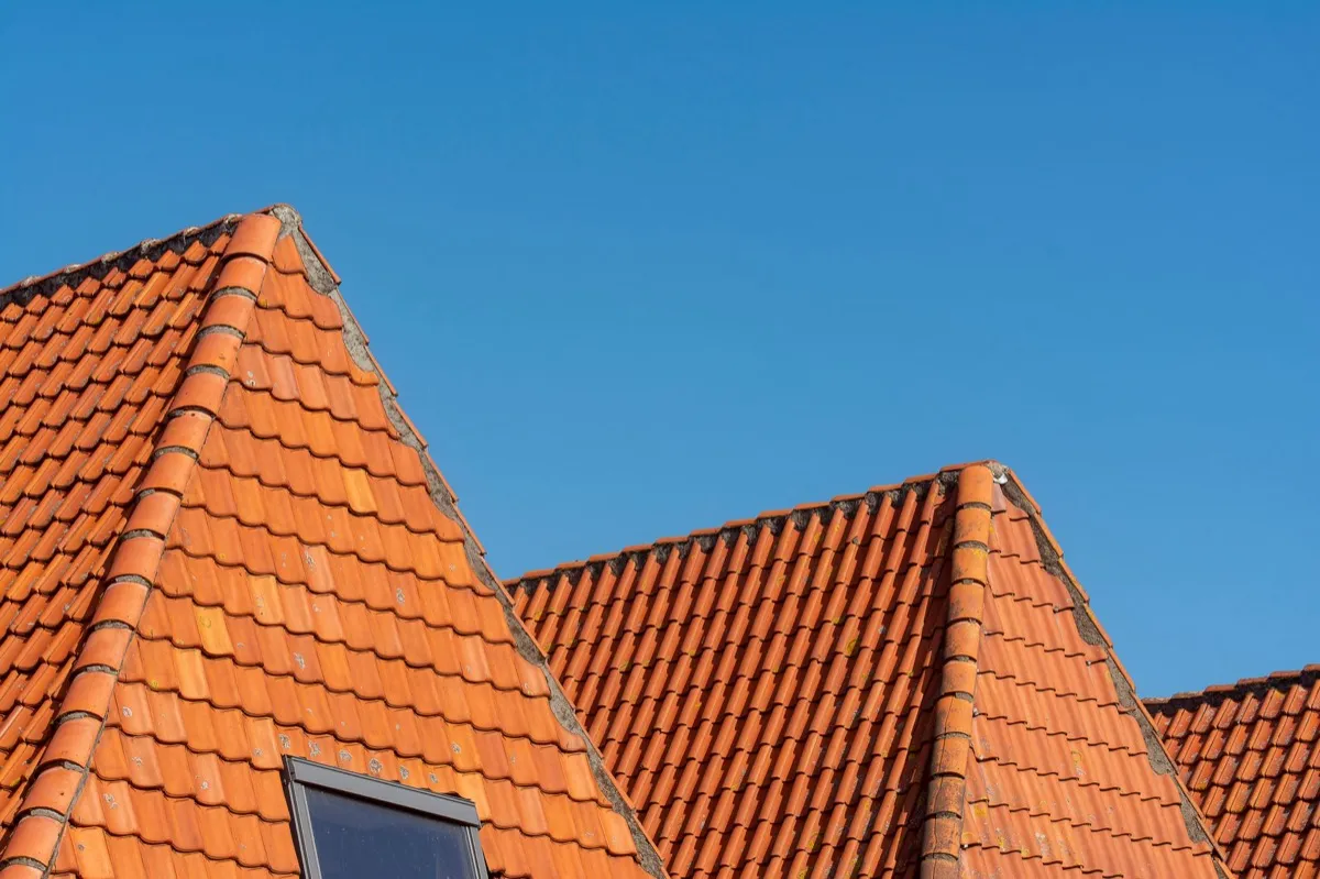 Clay barrel tile rooflines on homes in Janesville, WI