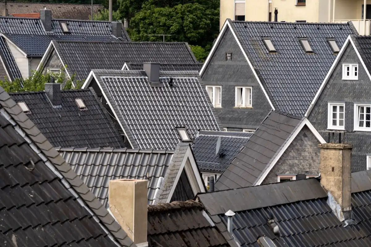 Steep roof eaves and gutter lines on houses in Janesville, WI